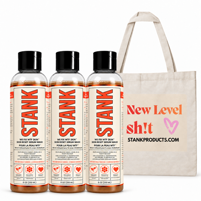 Three bottles of STANK Skin Reset Serum Wash 8 oz with the STANK canvas tote bag